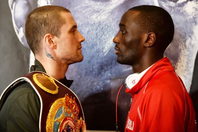 Ricky Burns, left, and Terence Crawford face off ahead of their WBO lightweight title fight. Picture: SNS