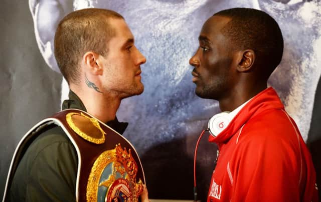 Ricky Burns, left, and Terence Crawford face off ahead of their WBO lightweight title fight. Picture: SNS