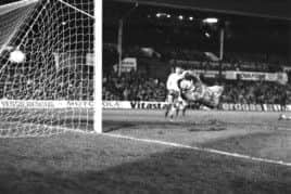 Bayern goalkeeper Raimond Aumann dives in vain as Iain Ferguson's shot flies past him. Picture: Bill Newton