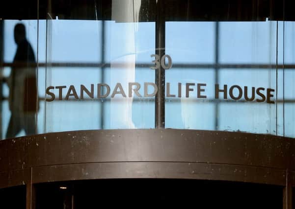 Standard Life chief executive David Nishs pay package last year fell by 1.5m. Picture: Neil Hanna