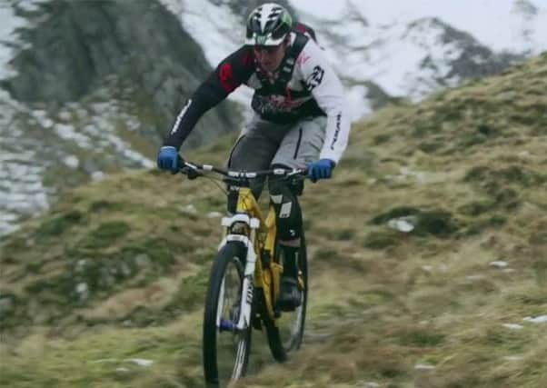 Steve Peat taking on the unridden trail in the Scottish mountains. Picture: Contributed
