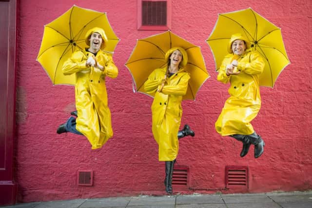 Brolly good: James Leece, Amy Ellen Richardson and Stephane Anelli. Picture: Ian Georgeson