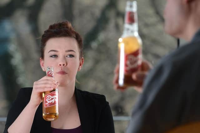 Tasters try out the new Dune Surfer beer. Picture: Neil Hanna