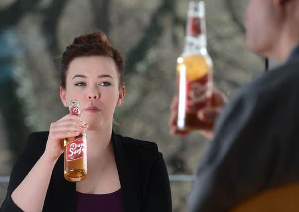 Tasters try out the new Dune Surfer beer. Picture: Neil Hanna