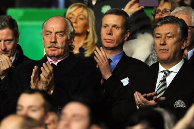 Dermot Desmond (centre) and Peter Lawwel Celtic Chief executive, ( right) in the directors' box at Celtic park . Picture: TSPL