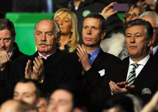 Dermot Desmond (centre) and Peter Lawwel Celtic Chief executive, ( right) in the directors' box at Celtic park . Picture: TSPL