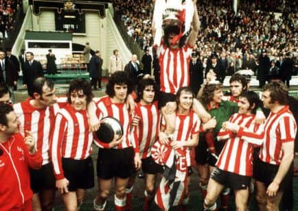 Sunderland skipper Bobby Kerr being carried aloft by teammates. Picture: PA