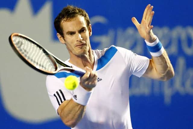 Andy Murray hits a return against Grigor Drimitrov during their semi-final. Picture: AFP/Getty