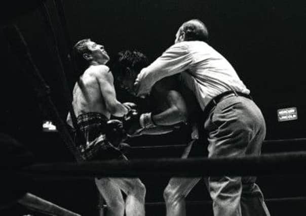 Roberto Duran lands a low punch on Ken Buchanan in their 1972 fight in New York. Picture: AP