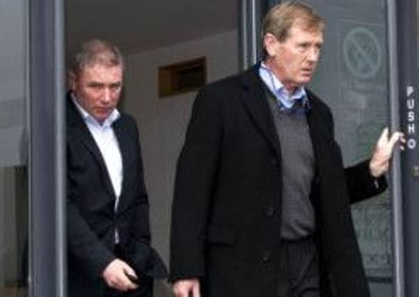 Rangers manager Ally McCoist leaves Ibrox with Dave King after a 2012 meeting. Picture: SNS