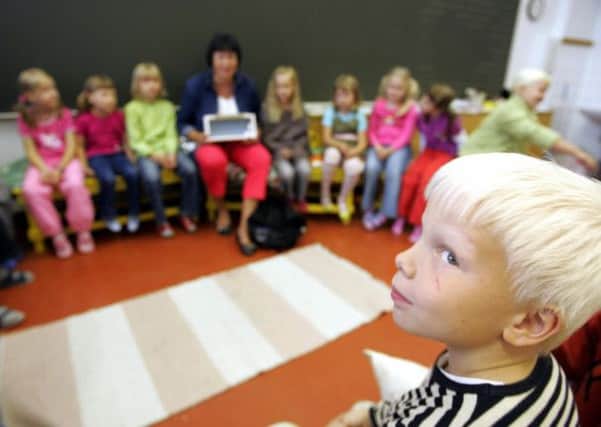 Finnish children in a classroom - pupils start school at age four in the country. Picture: Getty