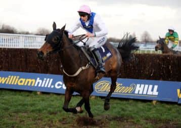 Night In Milan ridden by James Reveley jumps the last fence to win The William Hill Grimthorpe Chase Handicap Steeple Chase. Picture: PA