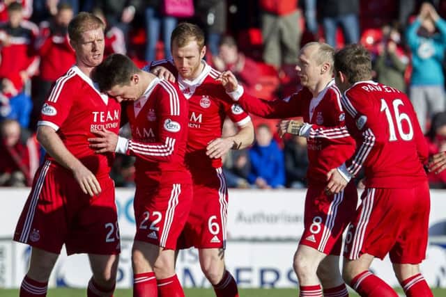 Ryan Jack is congratulated by his team-mates after scoring what turned out to be the winner. Picture: SNS