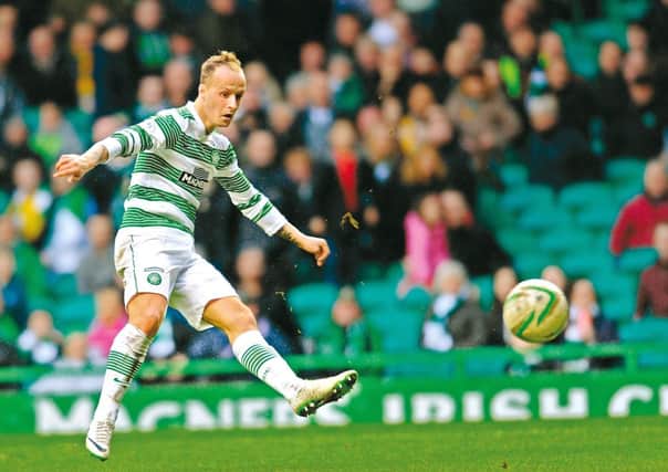 Leigh Griffiths scores to complete his hat-trick.  Picture: Robert Perry