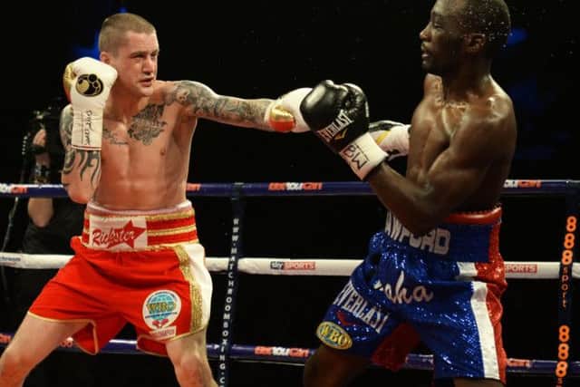 Ricky Burns takes on Terence Crawford - the American won a unanimous decision. Picture: SNS