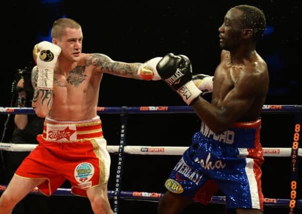 Ricky Burns takes on Terence Crawford - the American won a unanimous decision. Picture: SNS