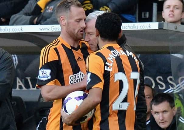 David Meyler of Hull City clashes with Alan Pardew. Picture: Getty
