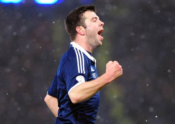 Grant Hanley celebrates scoring against Wales. Picture: Ian Rutherford