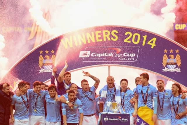 Manchester City players celebrate victory in the Capital One Cup Final. Picture: Getty