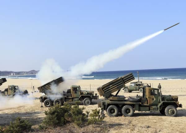 The South Korean armys rocket launchers fire live rounds during an exercise against possible attacks from North Korea. Picture: AP