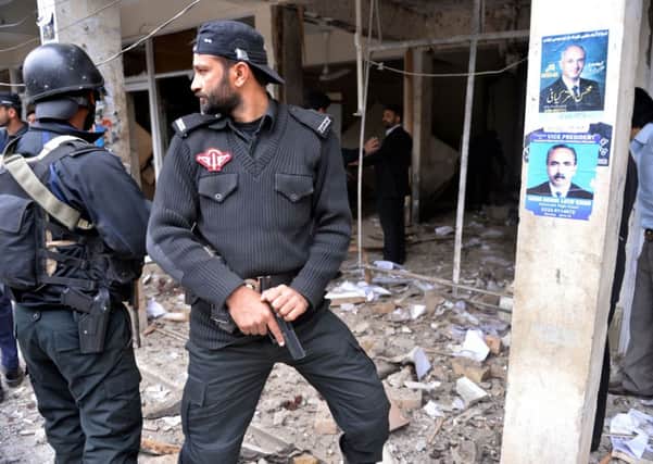 Police commandos cordon off the scene of the suicide bombings. Picture: Getty
