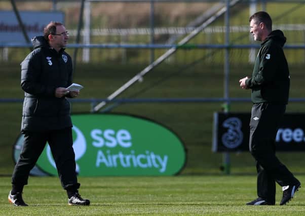 Assistant manager Roy Keane, right, looks on with Ireland manager Martin ONeill ahead of tomorrows match against Serbia. Picture: PA