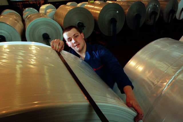 A British Polythene Industries worker at the firm's Greenock factory. Picture: Stephen Mansfield