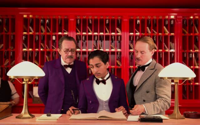 Tom Wilkinson, Tony Revolori, centre, and Owen Wilson in "The Grand Budapest Hotel." Picture: AP