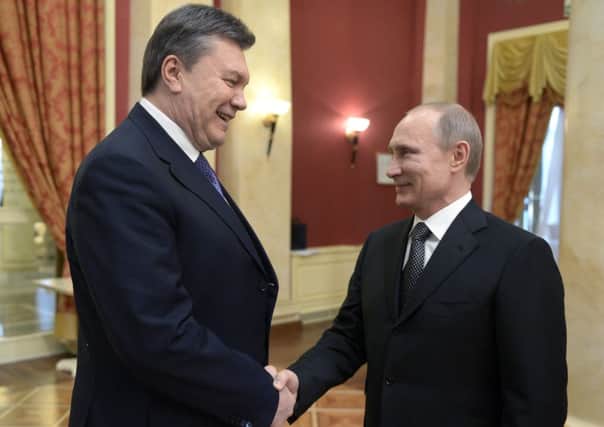 Vladimir Putin wants a stable Ukraine which can afford to pay its debts, and to him, Viktor Yanukovych is the democratic-ally elected president of that country, despite what some protesters may think. Picture: Getty
