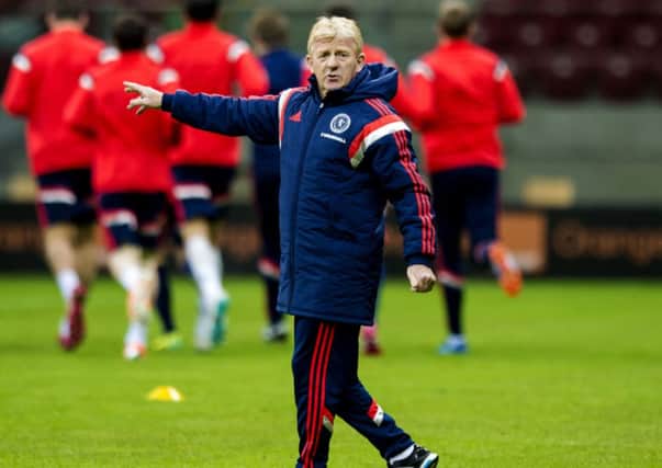 Scotland manager Gordon Strachan puts the squad through their paces at the National Stadium, Warsaw. Picture: SNS