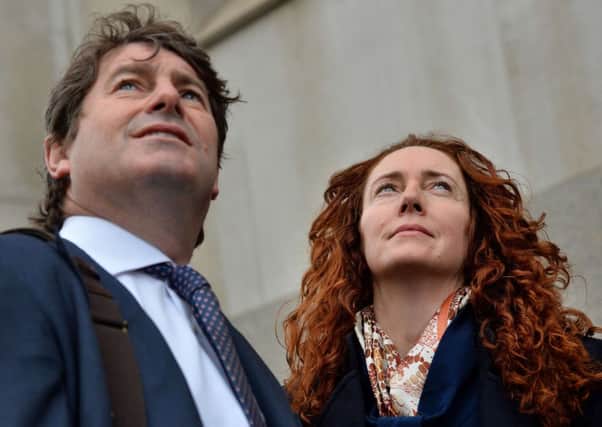 Rebekah Brooks (R) and husband Charlie Brooks (L) arrive at the Old Bailey yesterday. Picture: Getty