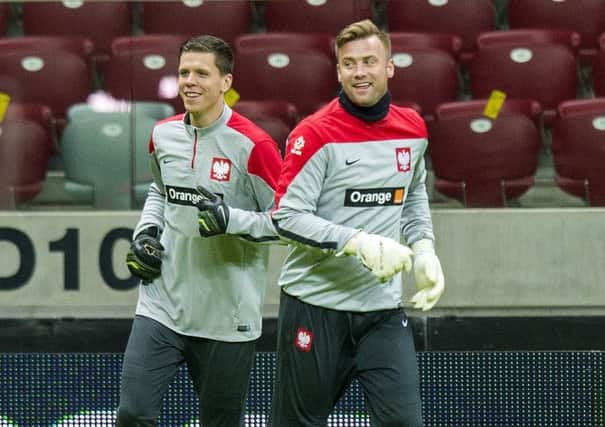 Poland keepers Artur Boruc (right) and Wojciech Szczesny in training. Picture: SNS