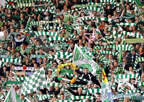 Celtic fans celebrate at their home ground. Picture: Jane Barlow