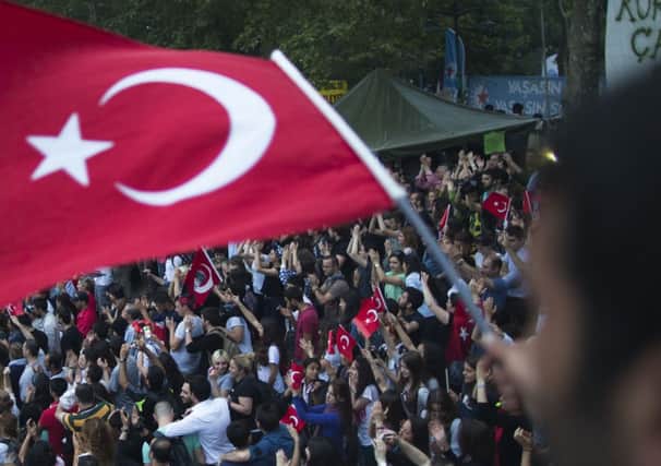 Turkish demonstrators gather in Gezi Park next to Taksim Square in Istanbul. Photograph: Uriel Sinai/Getty Images