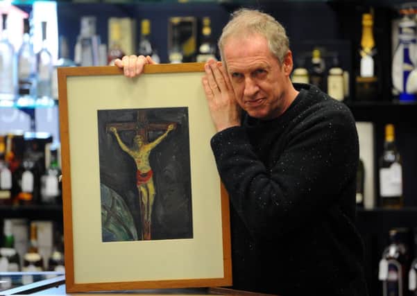 Peter Howson with Christ On The Cross, which he painted at the age of six. Picture: Robert Perry/TSPL