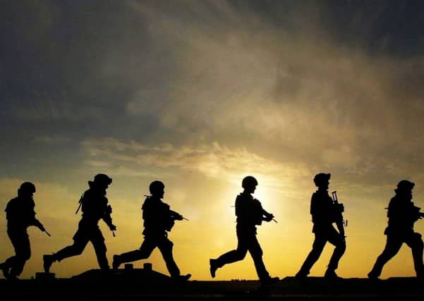 MPs warned that cutting thousands of troops could leave the army short of key personnel. Picture: PA