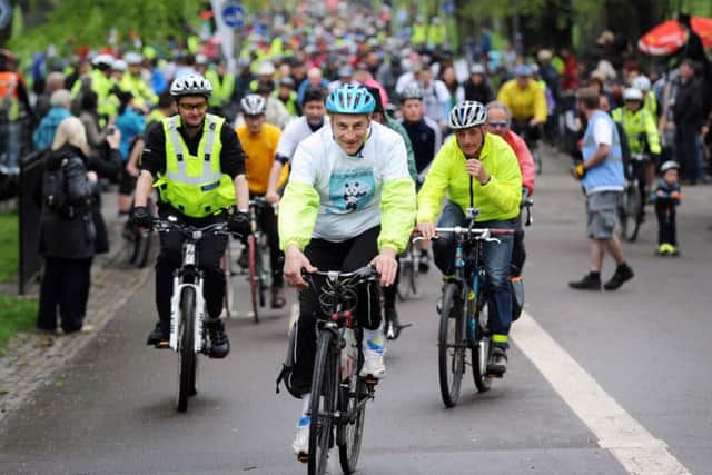 Cyclist Graeme Obree leading the Pedal On Parliament cycle back in May 2013. Picture: Jane Barlow.