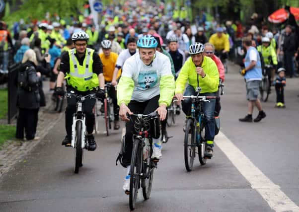 Cyclist Graeme Obree leading the Pedal On Parliament cycle back in May 2013. Picture: Jane Barlow.