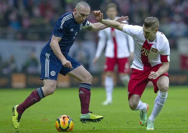Matchwinner Scott Brown on the ball in Warsaw last night.  Picture: Getty
