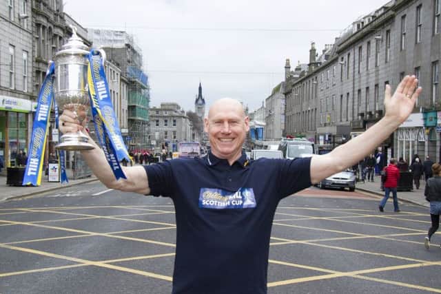 Doug Rougvie pictured with the William Hill Scottish Cup ahead of the Dons cup tie against Dumbarton on Saturday. Picture: Paul Reid