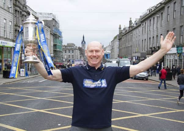Doug Rougvie pictured with the William Hill Scottish Cup ahead of the Dons cup tie against Dumbarton on Saturday. Picture: Paul Reid