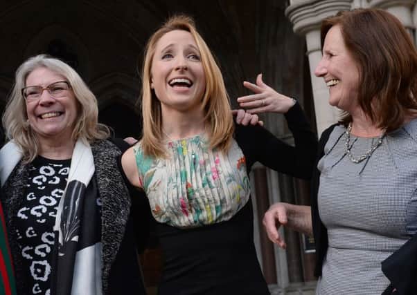 Over the moon Beth Warren, centre, at the High Court with mother Georgina Hyde, right, after retaining the chance to carry her late husbands child. Picture: PA