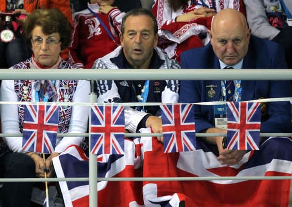 Matt Murdoch (centre) has died - his son David, Olympic curling medallist, has paid tribute in a statement. Picture: PA