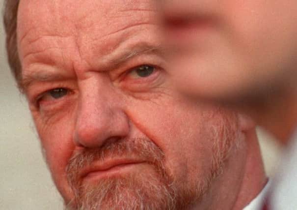 Robin Cook listens to then US under secretary of state Strobe Talbot on the Kosovo crisis in 1999. Picture: AP