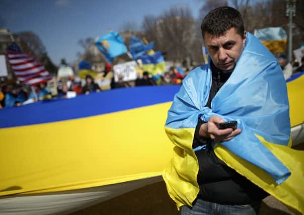 Demonstrators rally against Russia's aggression in Ukraine outside the White House today. Picture: Getty