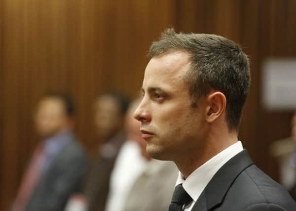 Oscar Pistorius carried a firearm 'all the time', an ex-girlfriend has said in court. Picture: AP