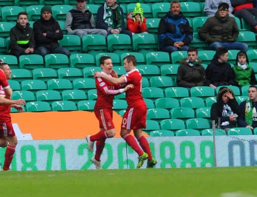 Peter Pawlett scores the winner for Aberdeen against Celtic. Picture Robert Perry