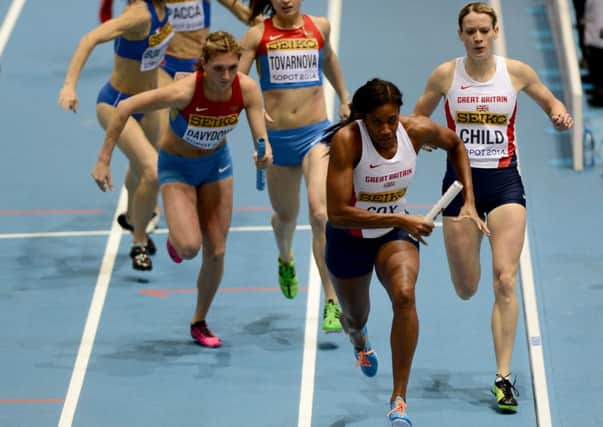 Eilidh Child passes the baton to Shana Cox as Great Britains 4x400 team head to victory. Picture: Getty