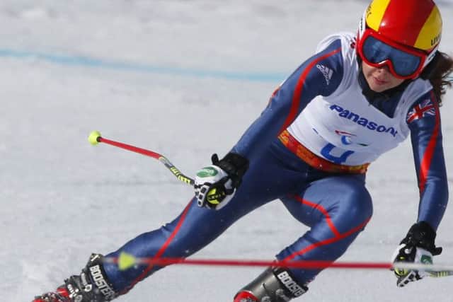 Jade Etherington won silver medal in the women's downhill, visually impaired event. Picture:Dmitry Lovetsky