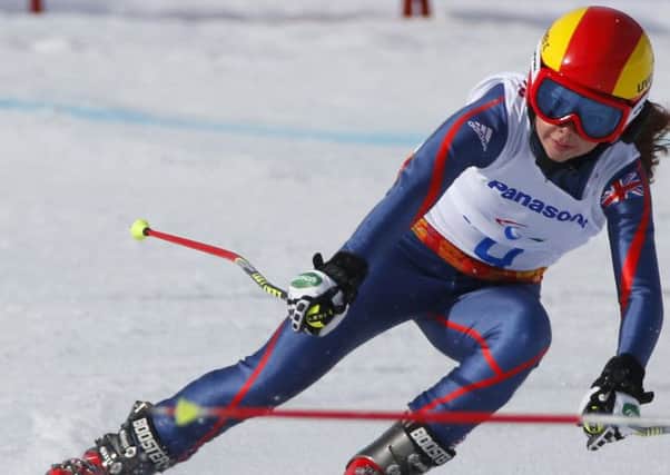 Jade Etherington won silver medal in the women's downhill, visually impaired event. Picture:Dmitry Lovetsky